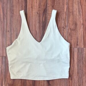 Women’s light support flex ribbed v neck crop top in light yellow